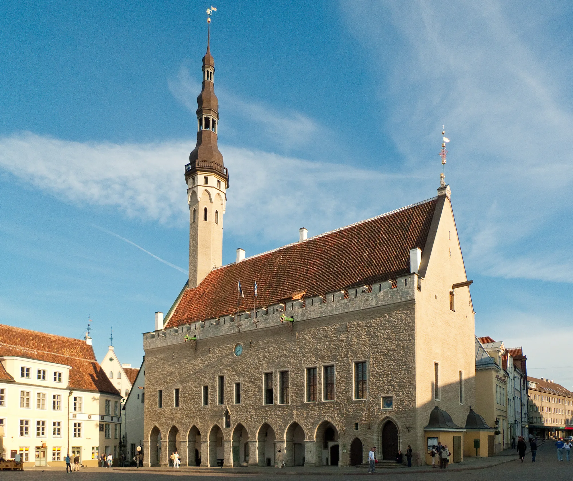 Tallinn's Gothic stone Town Hall (Raekoda) with its tall octagonal tower topped by the Old Thomas weathervane